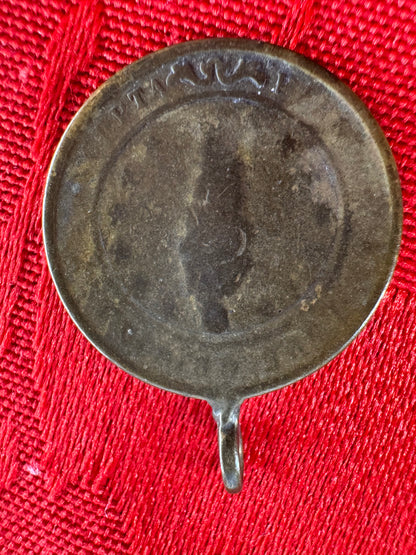 Old coin pendant