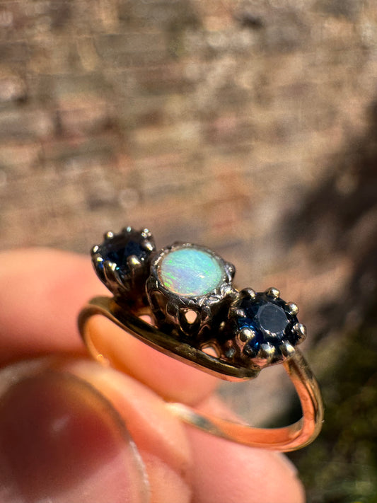 Lot 9: Antique 18ct Opal Sapphire Trilogy Yellow Gold Ring (Estimate £100-200)