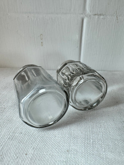 Pair of antique/vintage sterling silver topped salt and pepper pots with faceted glass