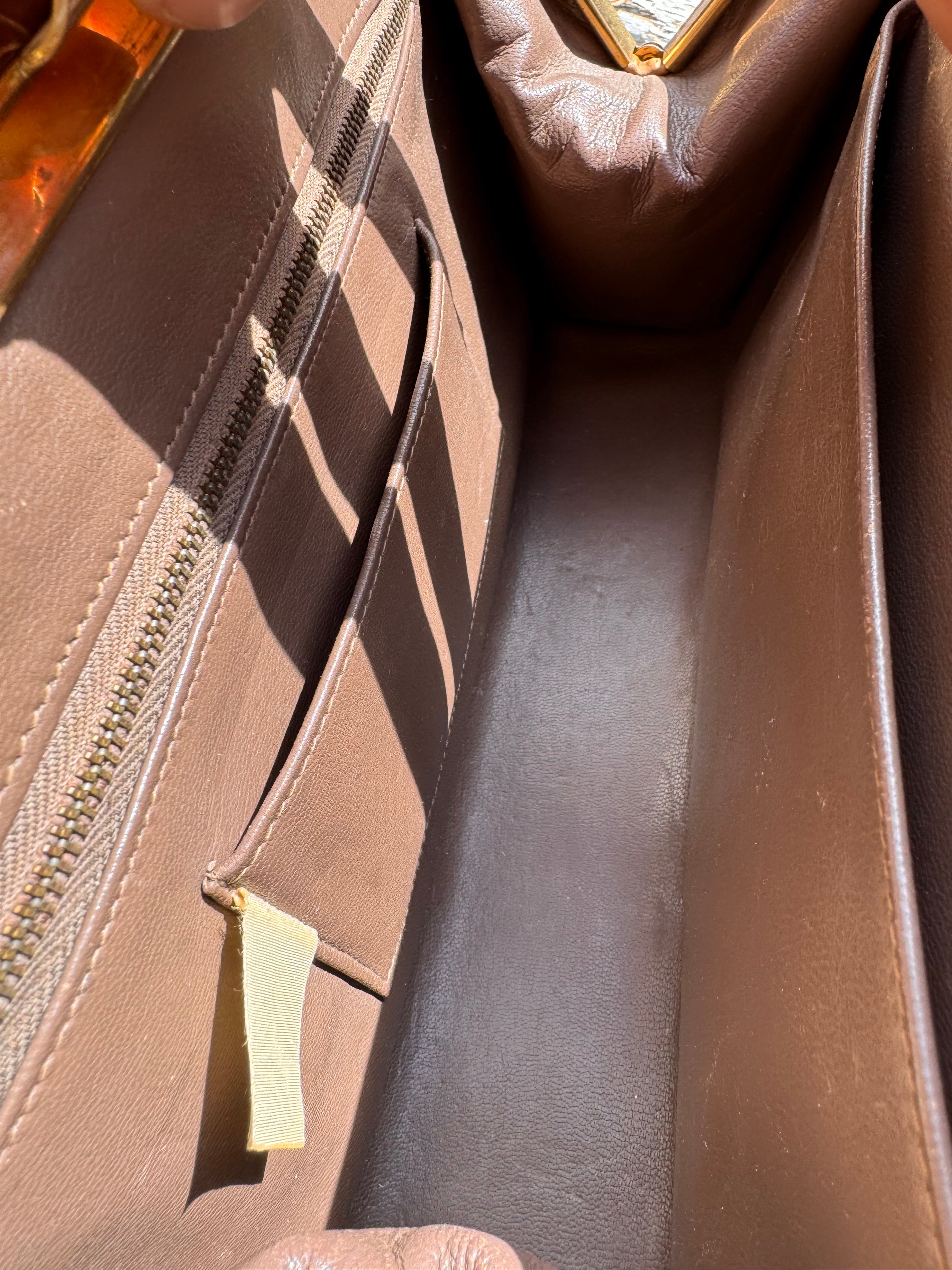 Lot 18: vintage crocodile handbag (Estimate £10-20)