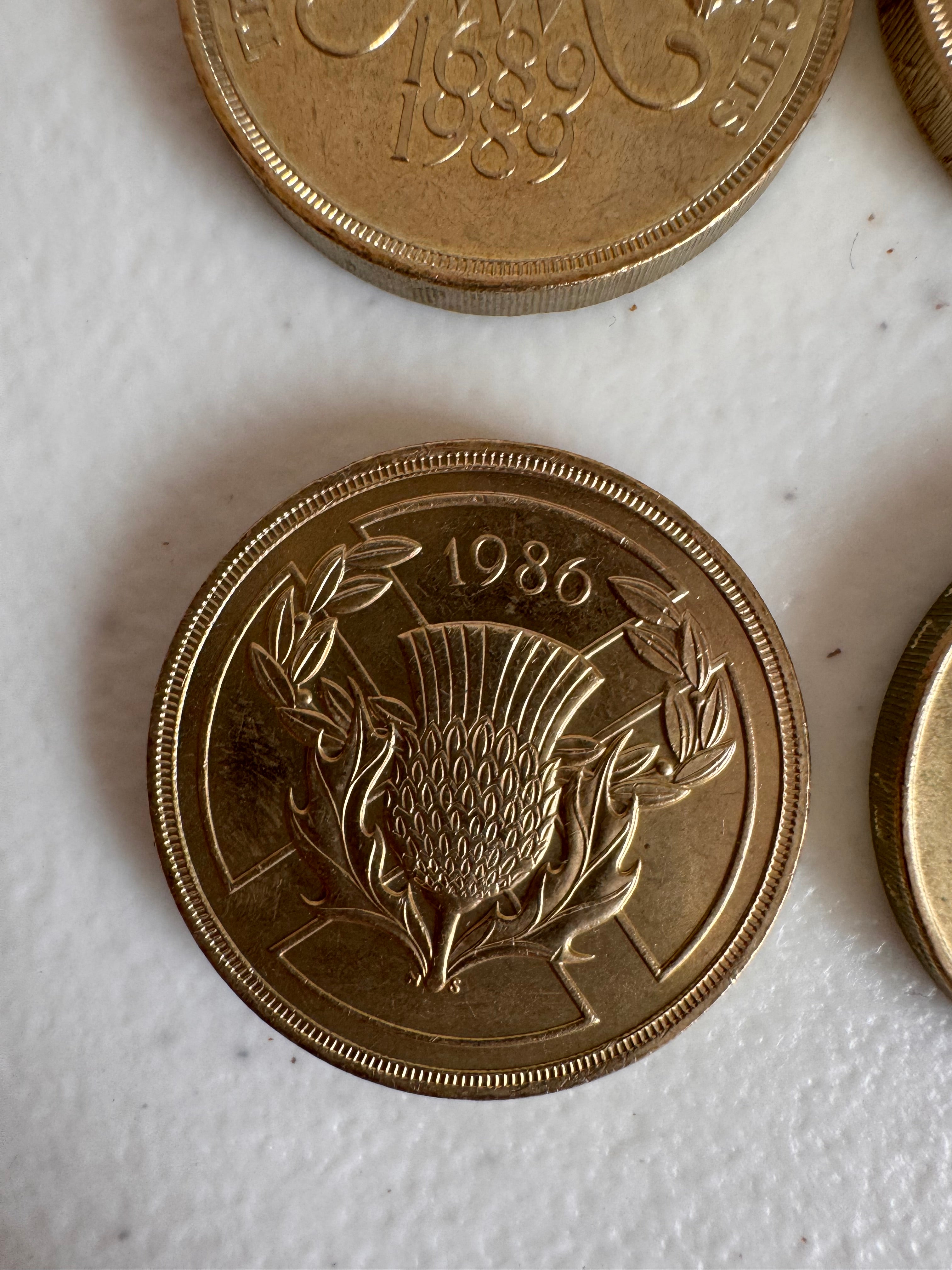 Lot 39: Rare discontinued £2 coins x 4 (Estimate £5-20)