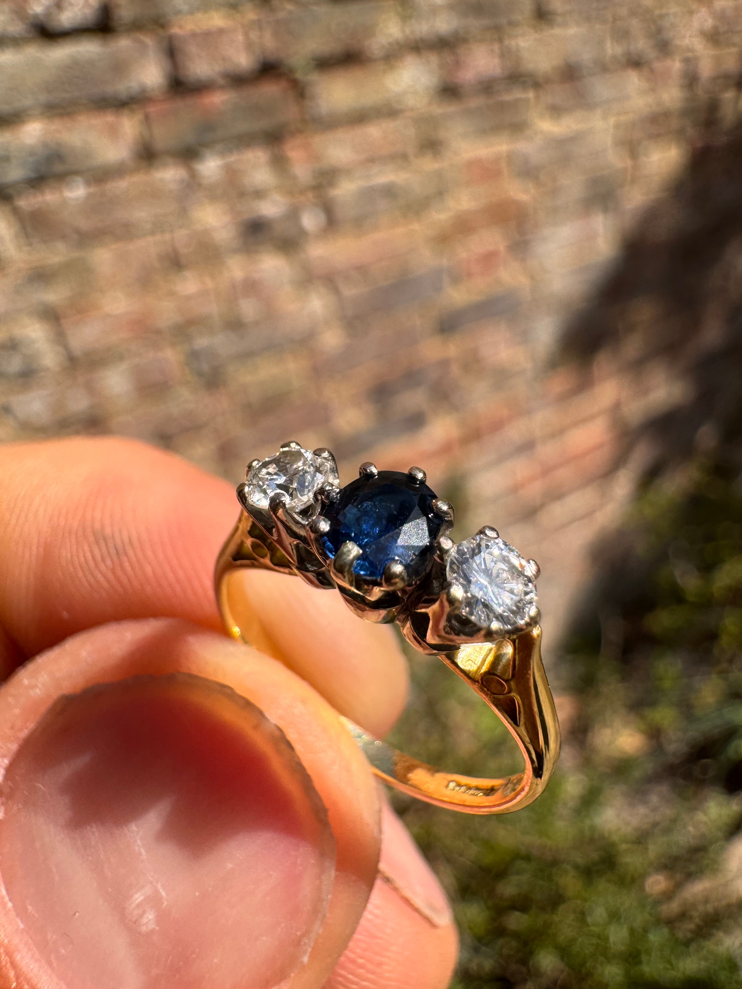 Lot 16: 18ct Trilogy Sapphire Diamond Ring (Estimate £300-400)