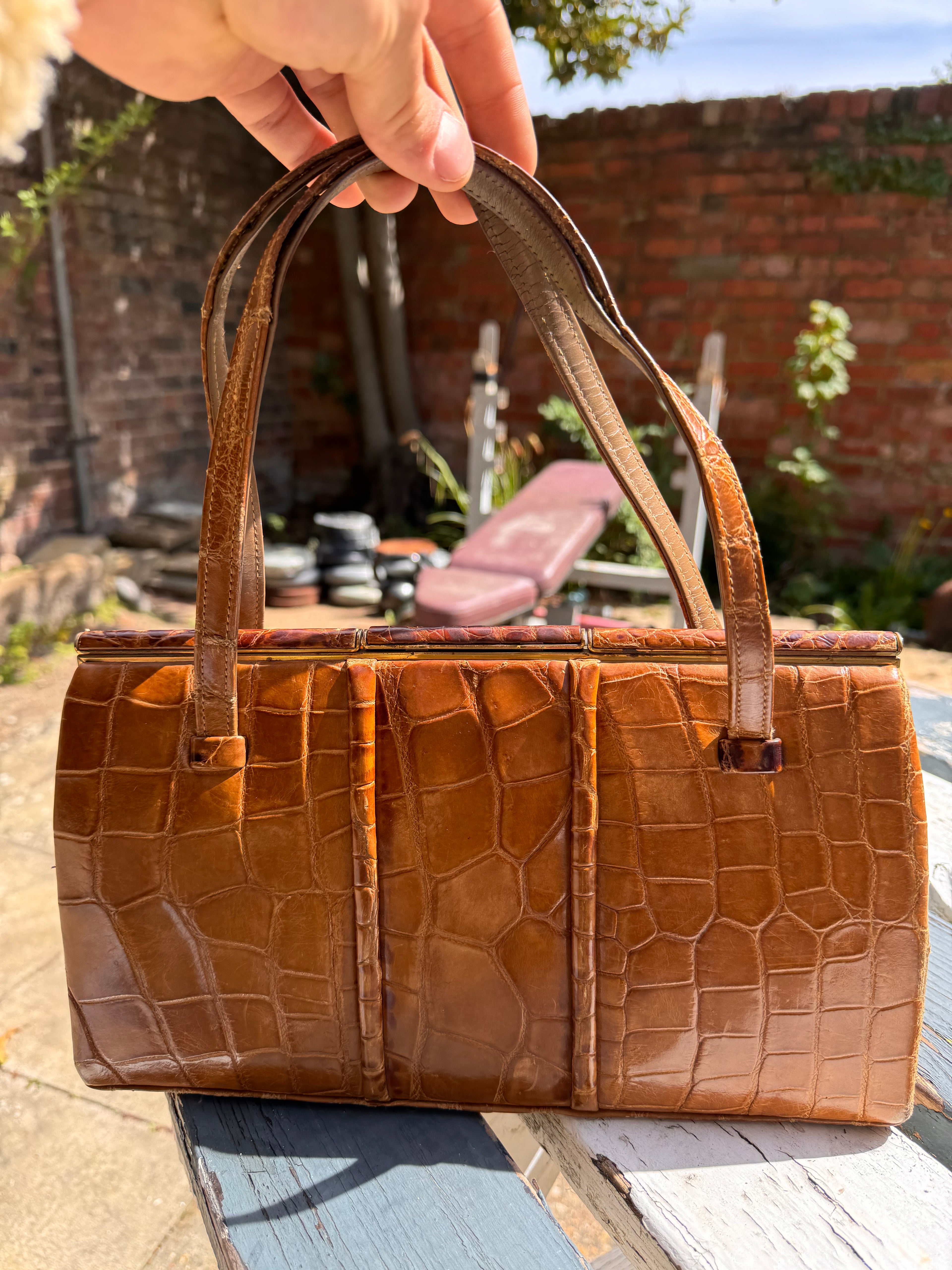 Lot 18: vintage crocodile handbag (Estimate £10-20)