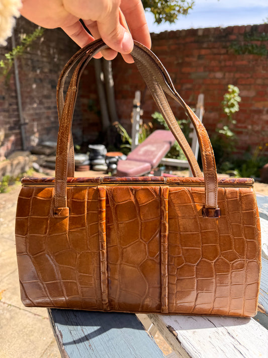 Lot 18: vintage crocodile handbag (Estimate £10-20)