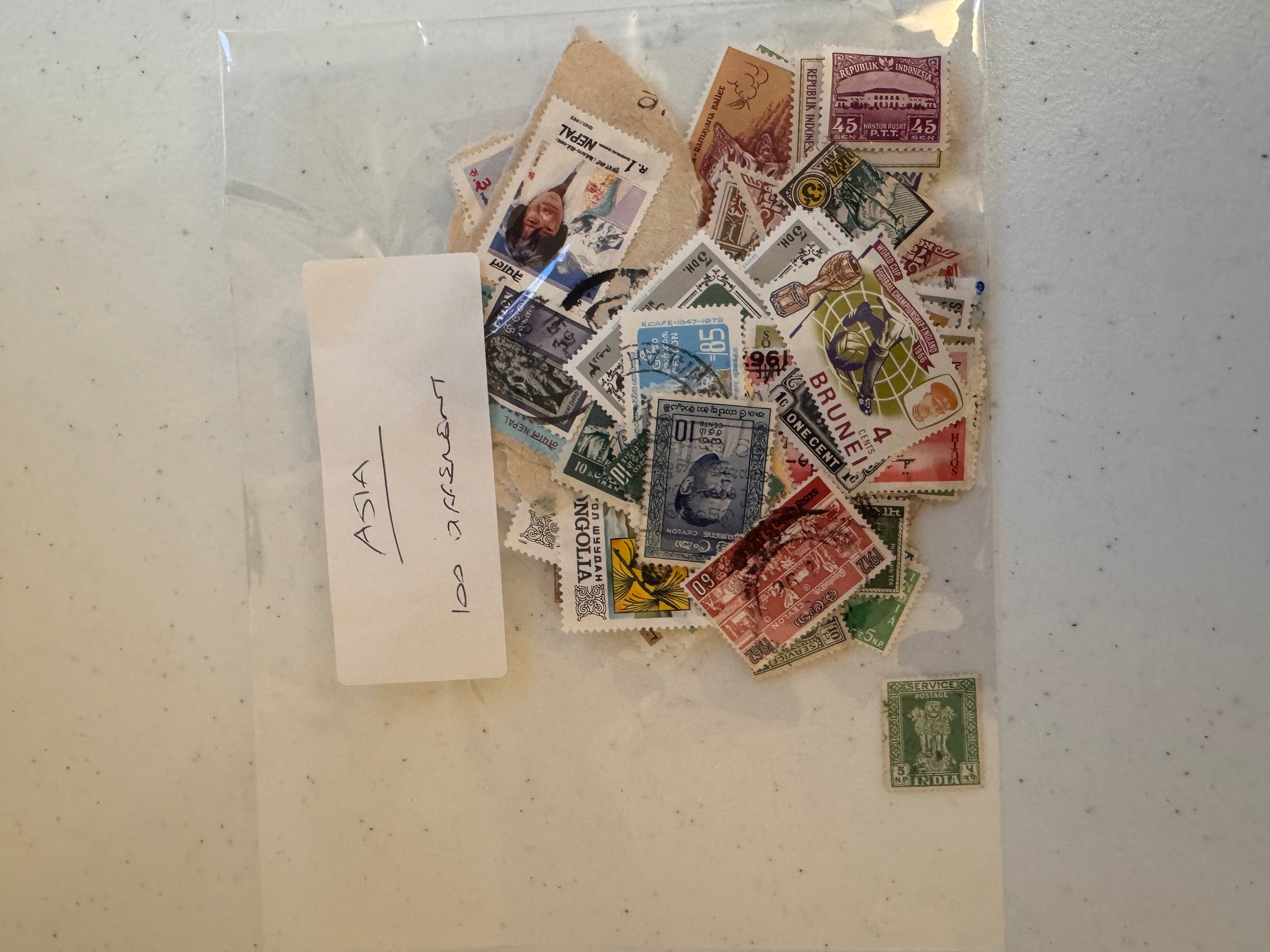Lot 64: Asia Stamps x 100  (Estimate £10-20)