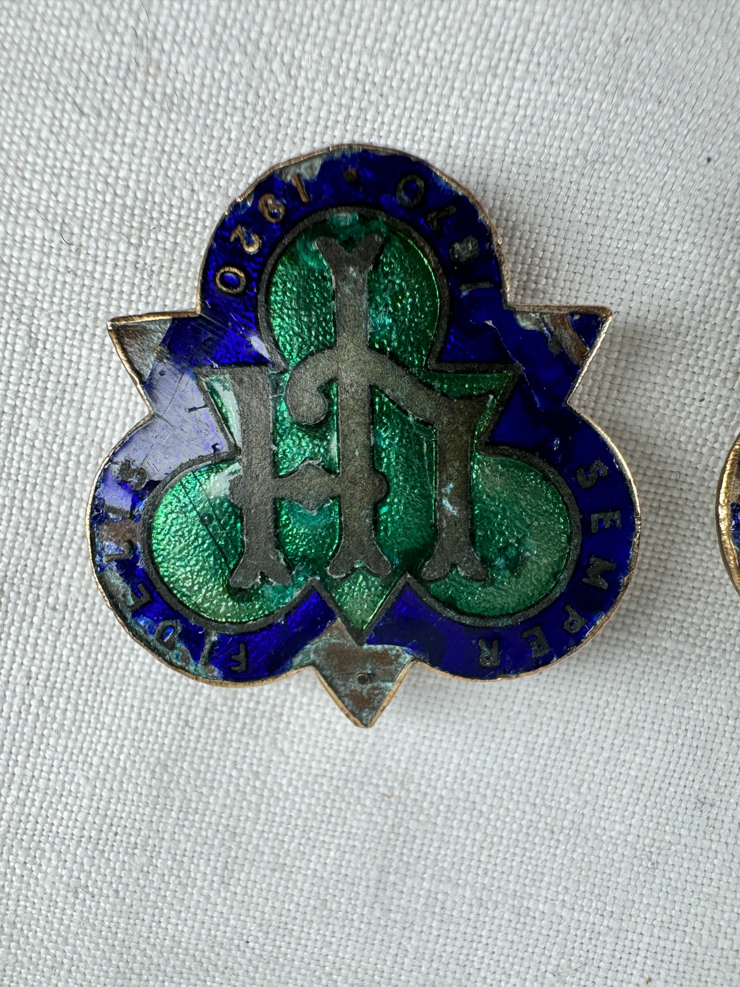 Two antique enamelled badges marked 'SEMPER FIDELIS 1870-1920' centrally  'L H'.