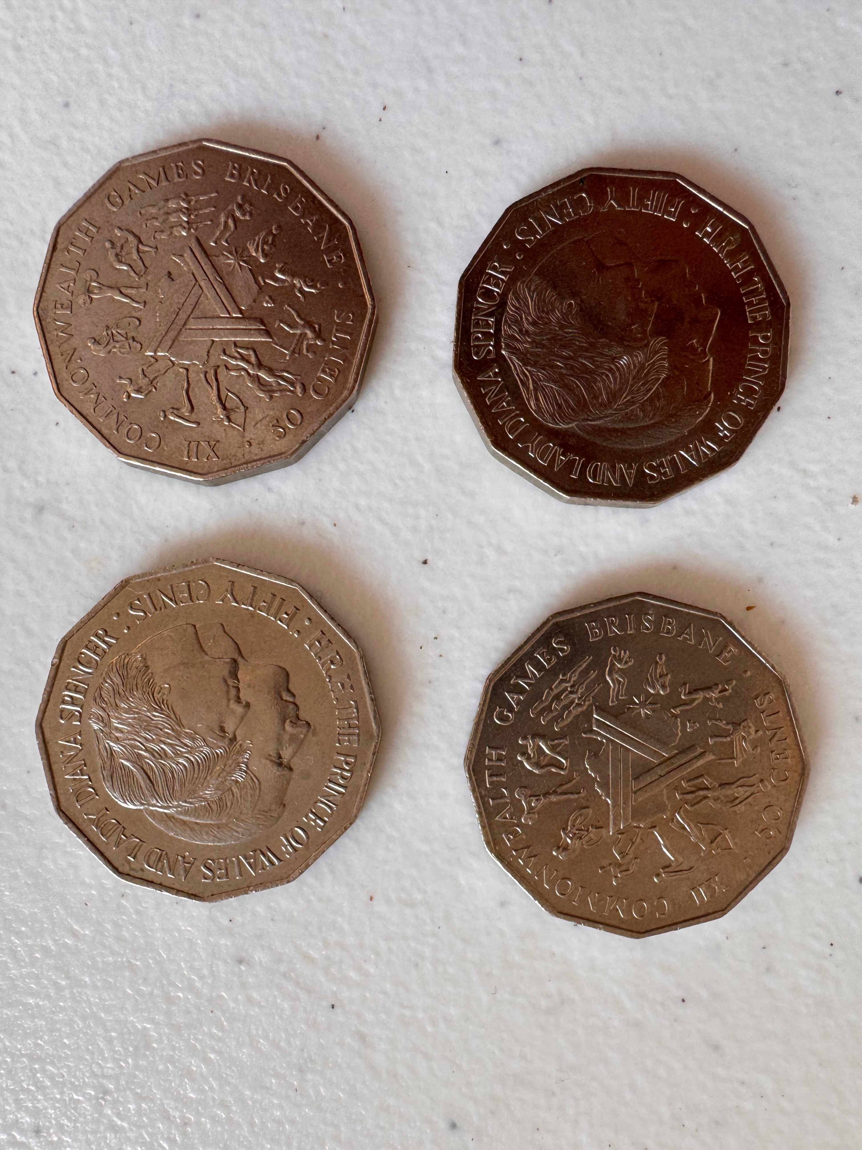 Lot 52: Australia 50 cents old coins x 4 (Estimate £5)