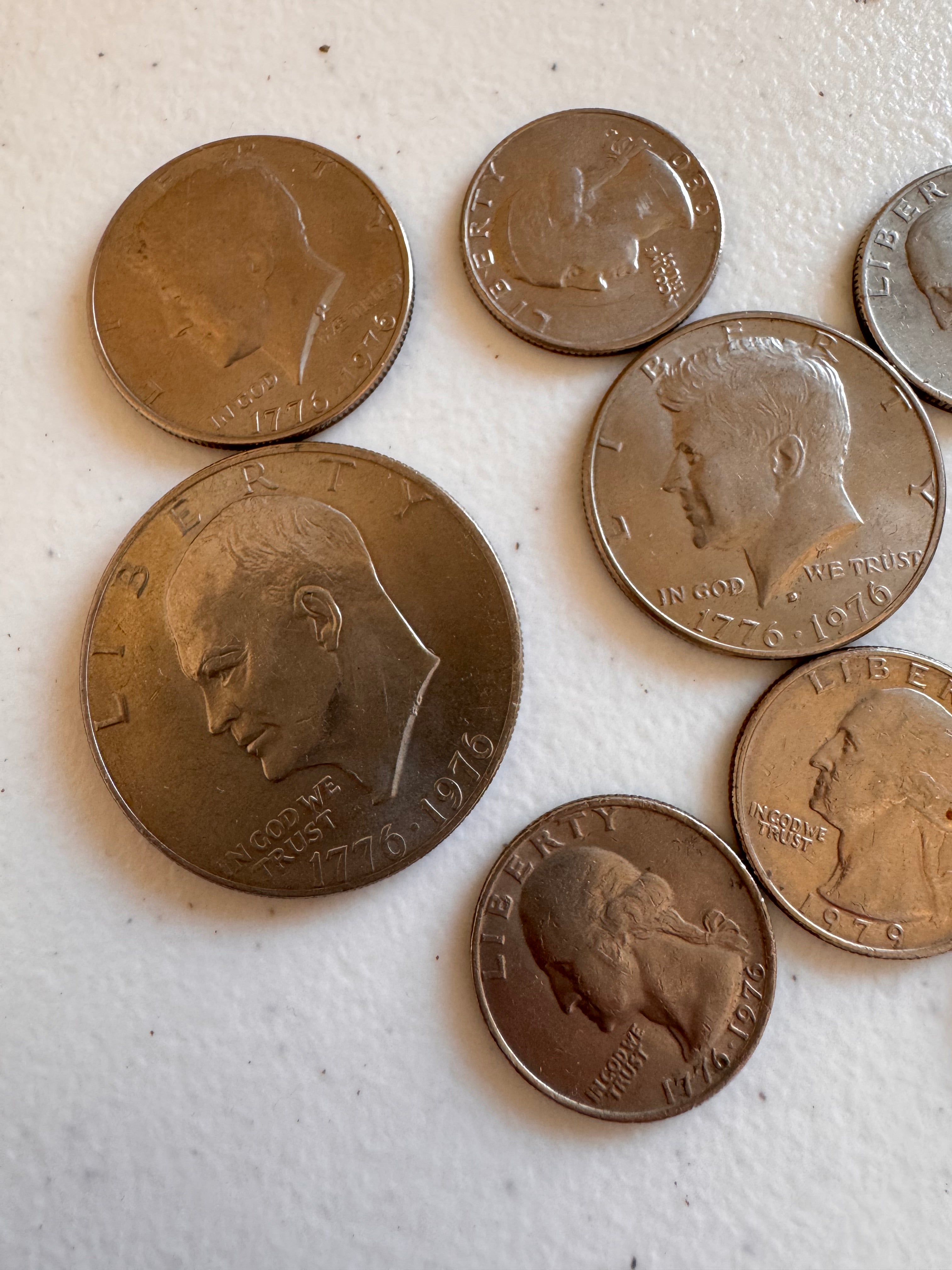 Lot 58: 1776-1976 S SILVER $1 + more (Estimate £30-50)