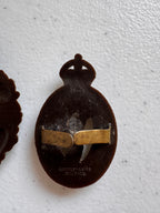 Lot 43: A rare Second World War period King's Own Malta Regiment economy plastic cap badge + other (Estimate £100-200)