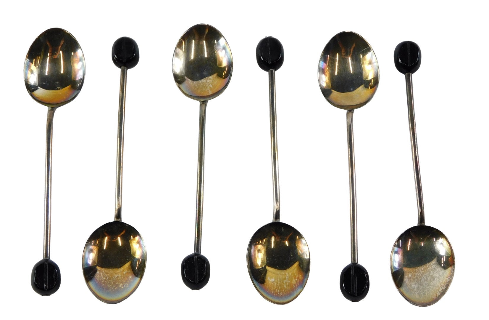 A cased set of six silver and enamel coffee bean spoons