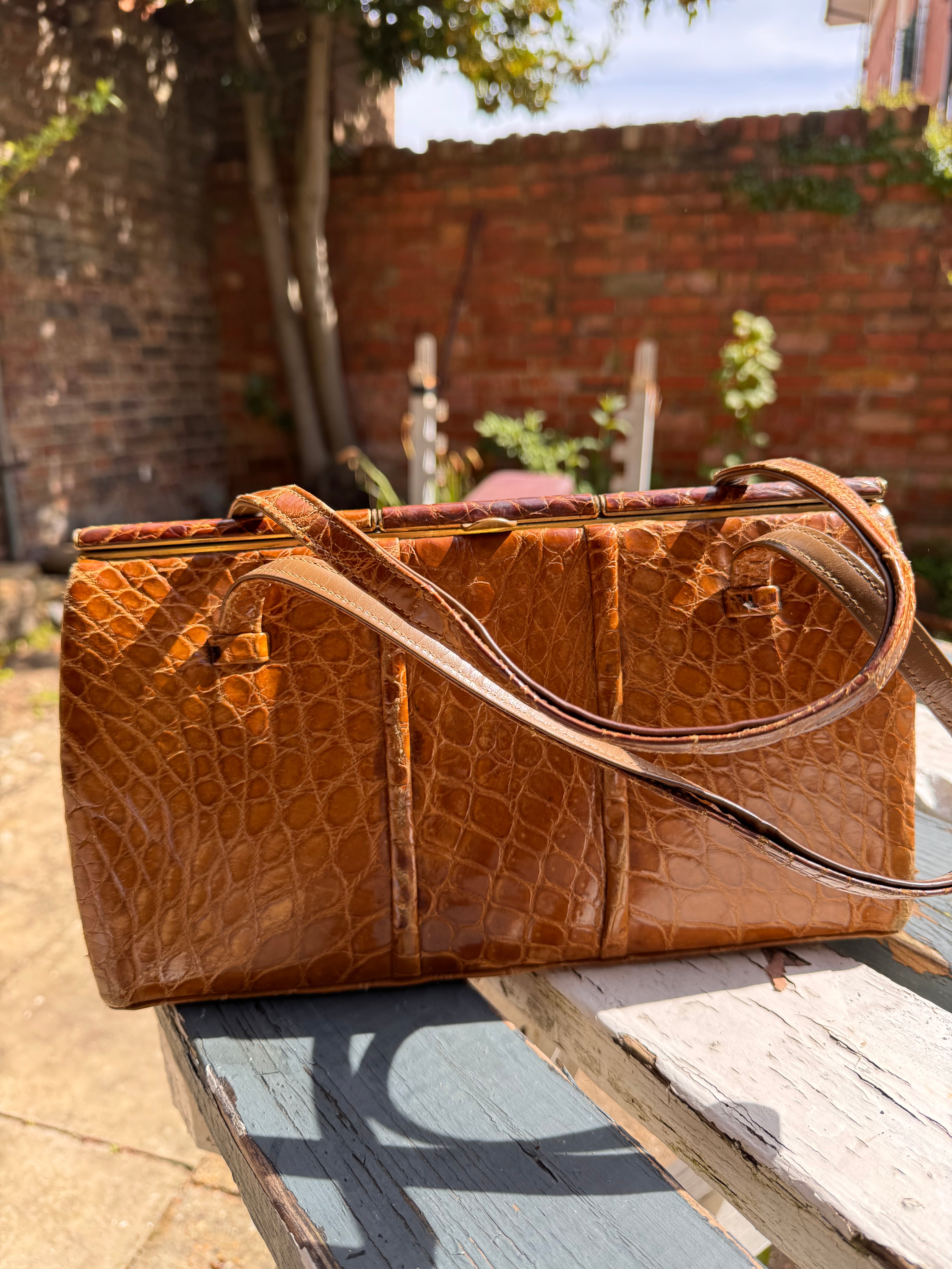 Lot 18: vintage crocodile handbag (Estimate £10-20)