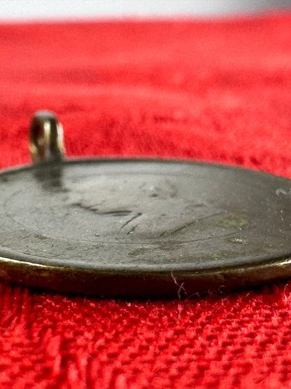 Old coin pendant
