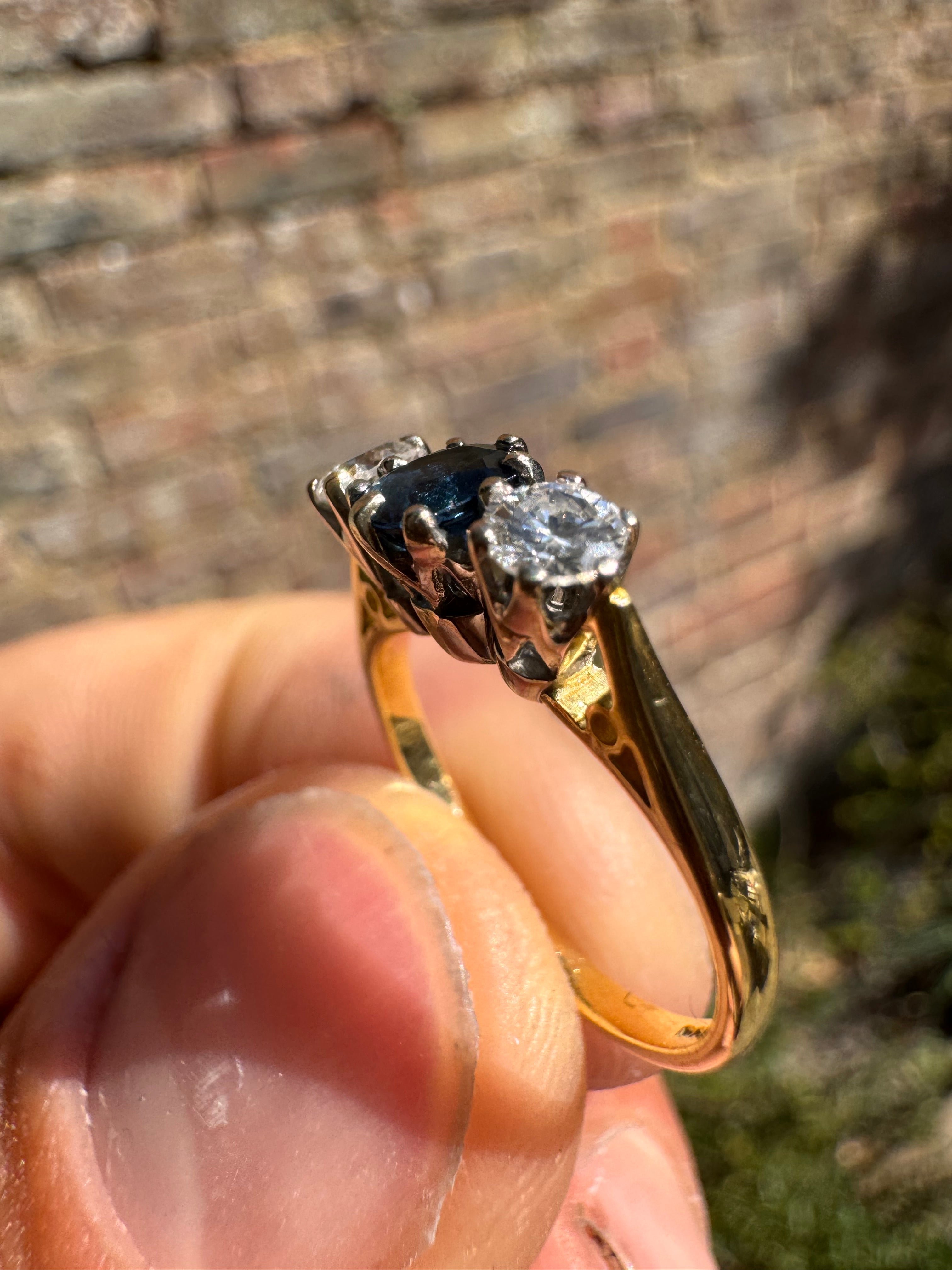 Lot 16: 18ct Trilogy Sapphire Diamond Ring (Estimate £300-400)