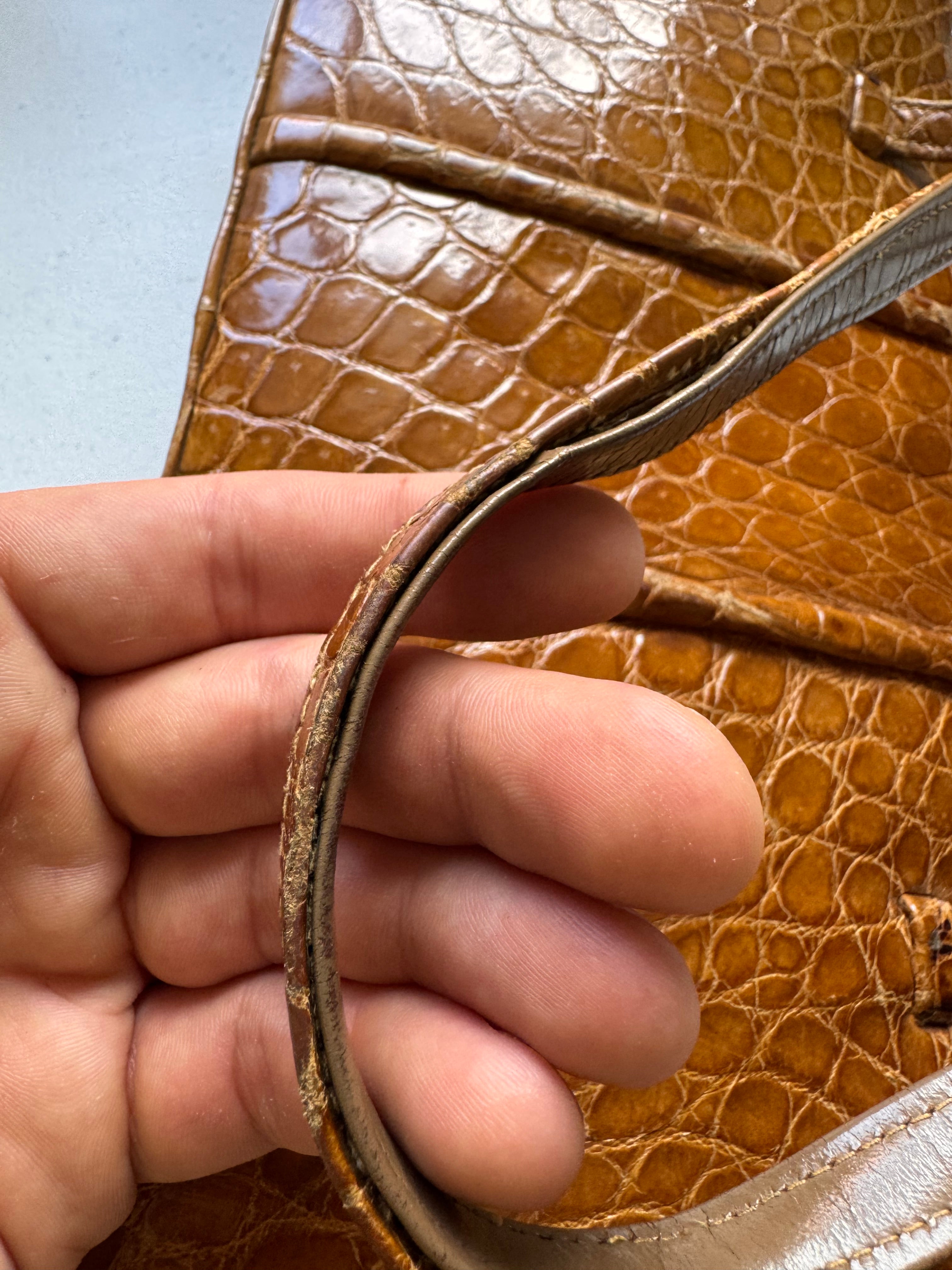 Lot 18: vintage crocodile handbag (Estimate £10-20)