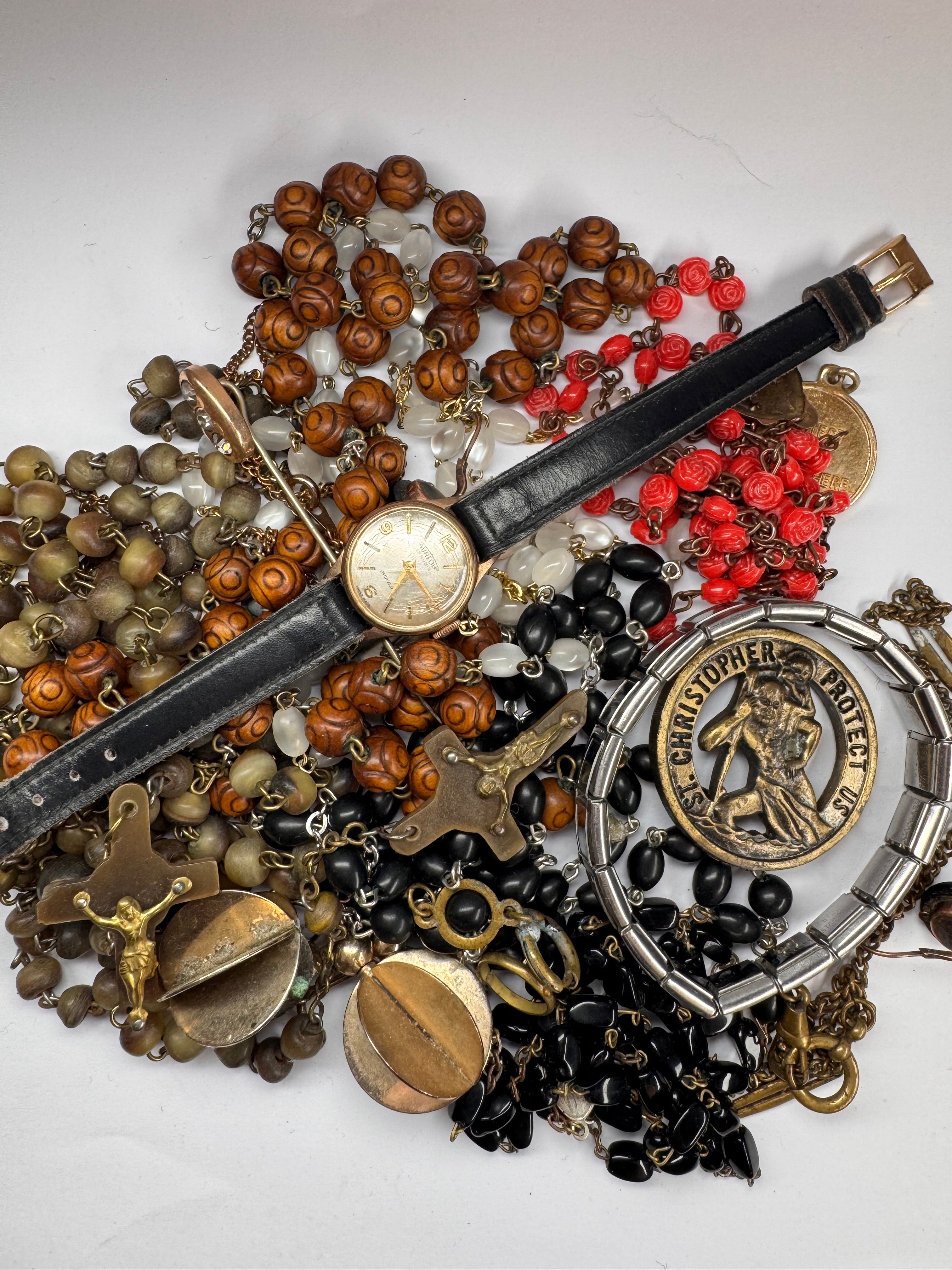 Broken vintage jewellery