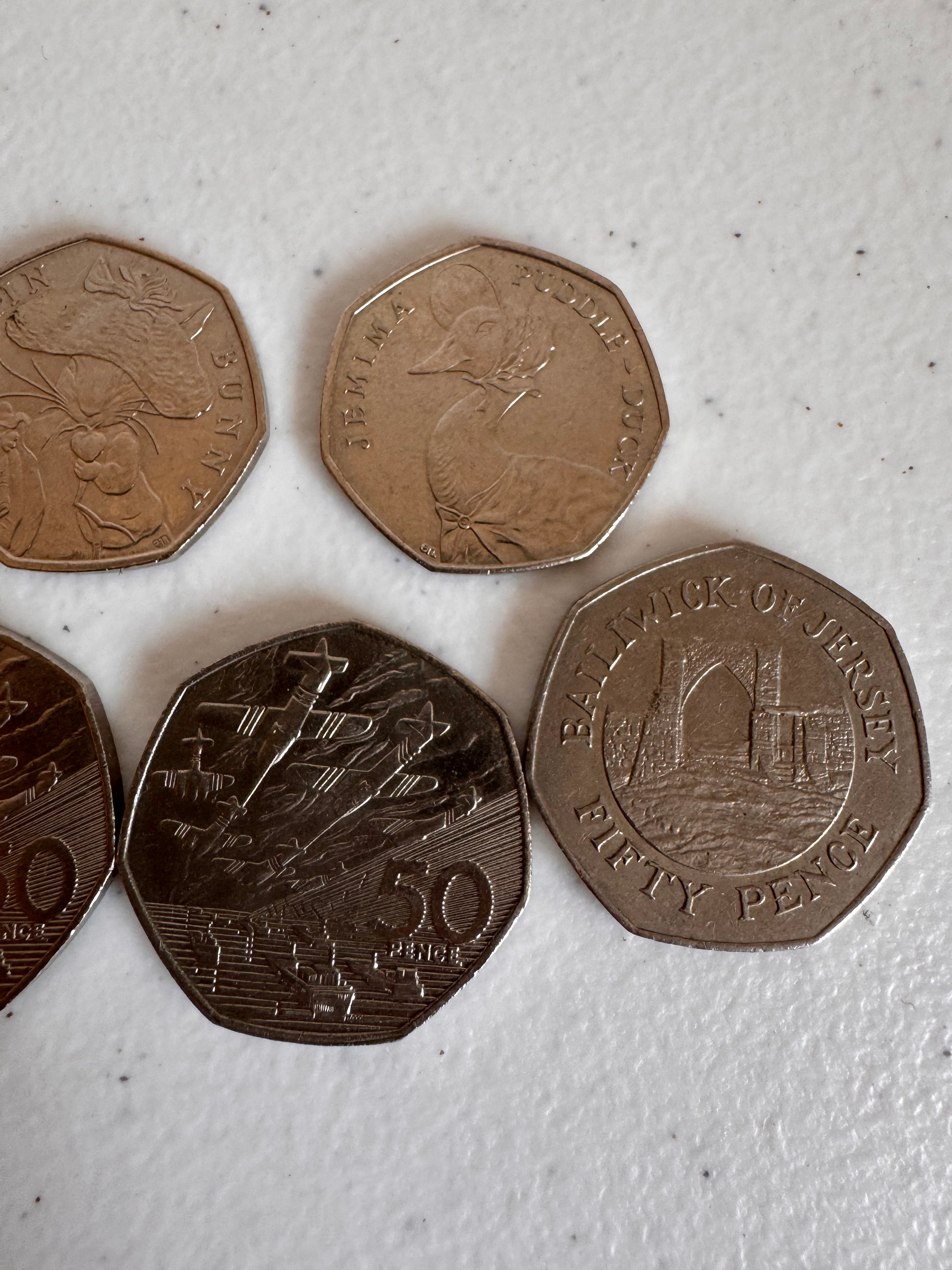 Lot 35: Rare 50ps x 9 (Estimate £10-20)