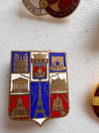 Lot 45: A collection of Arsenal badges + more (estimate £20)