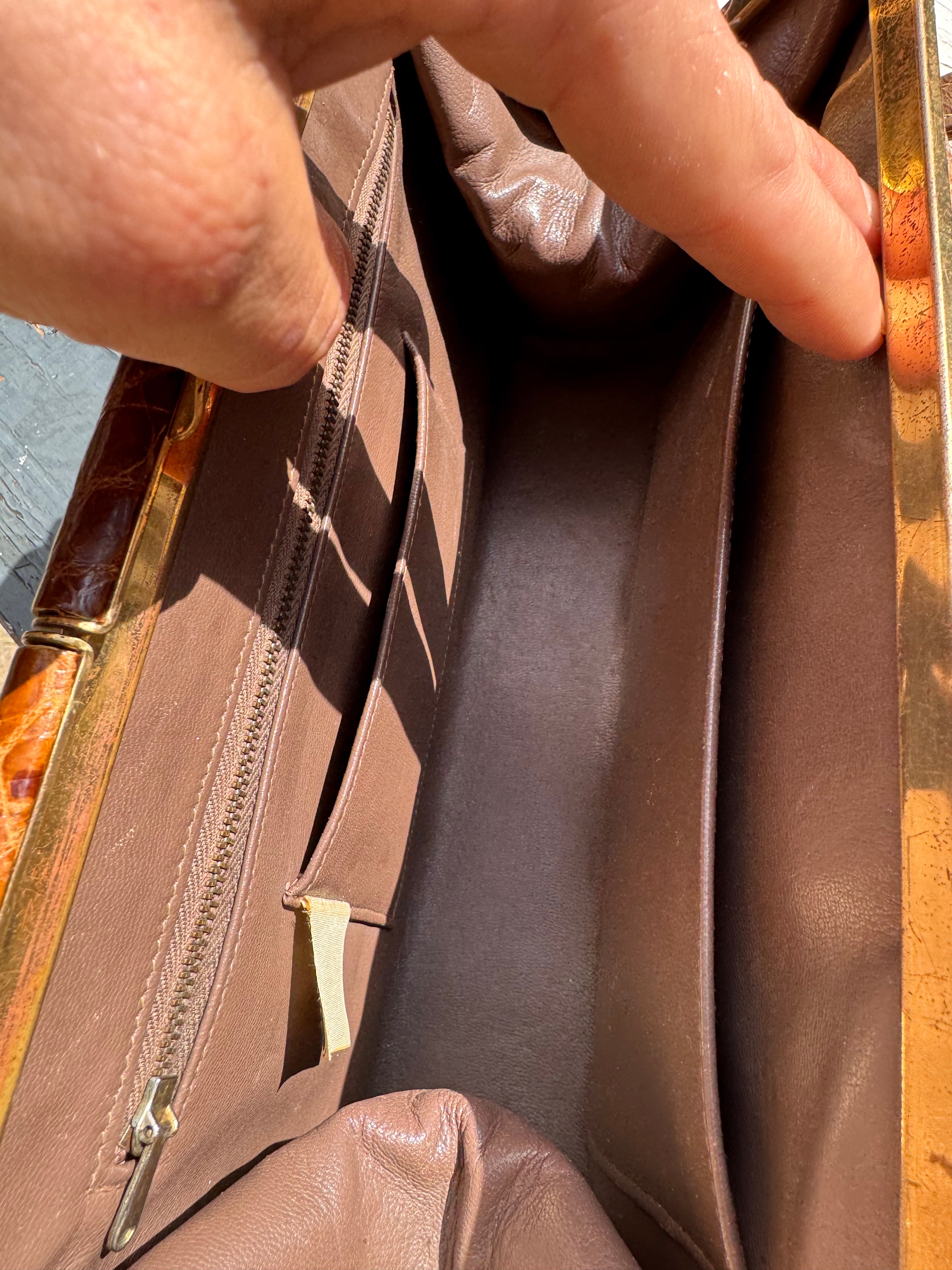 Lot 18: vintage crocodile handbag (Estimate £10-20)