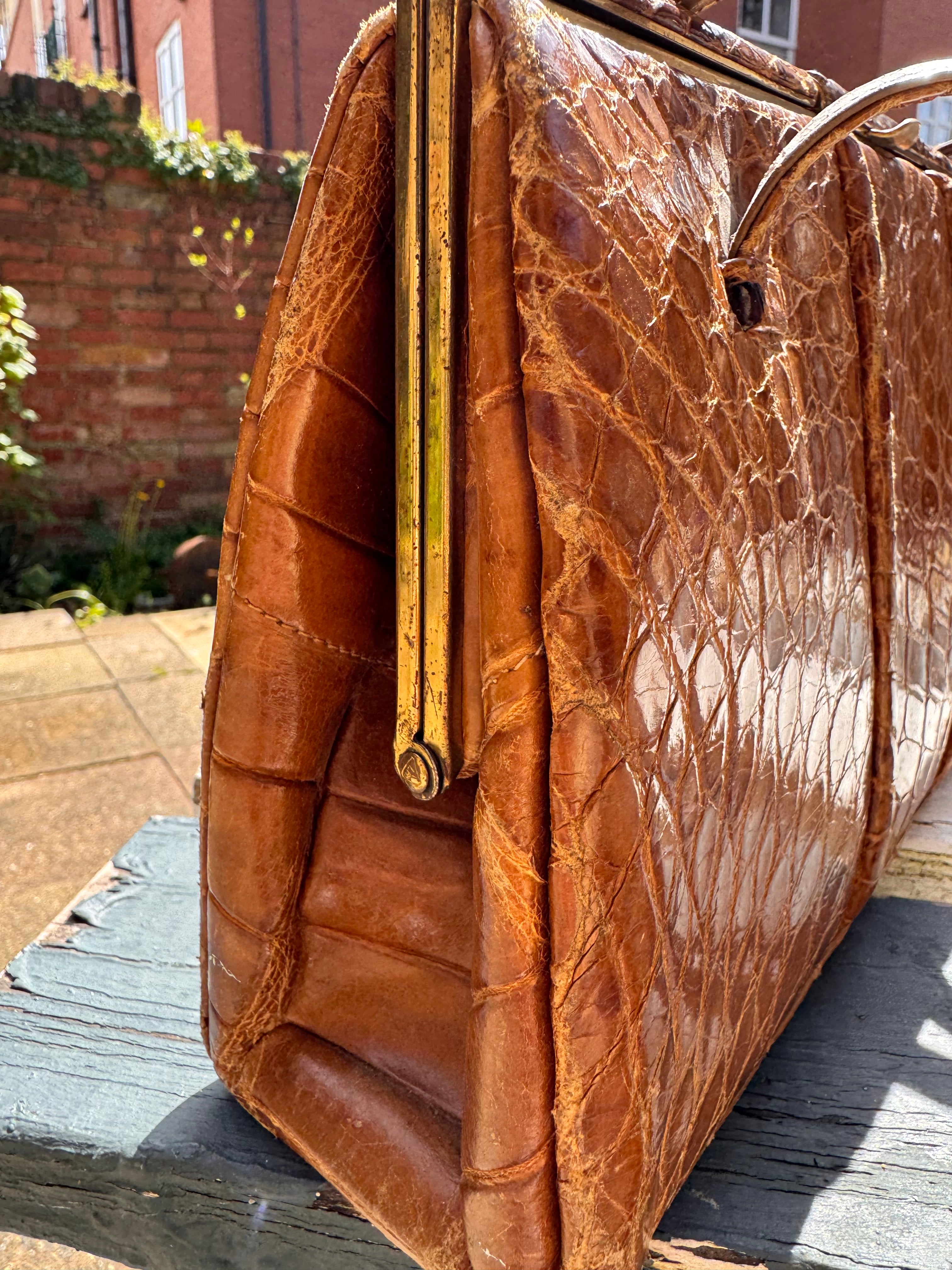 Lot 18: vintage crocodile handbag (Estimate £10-20)