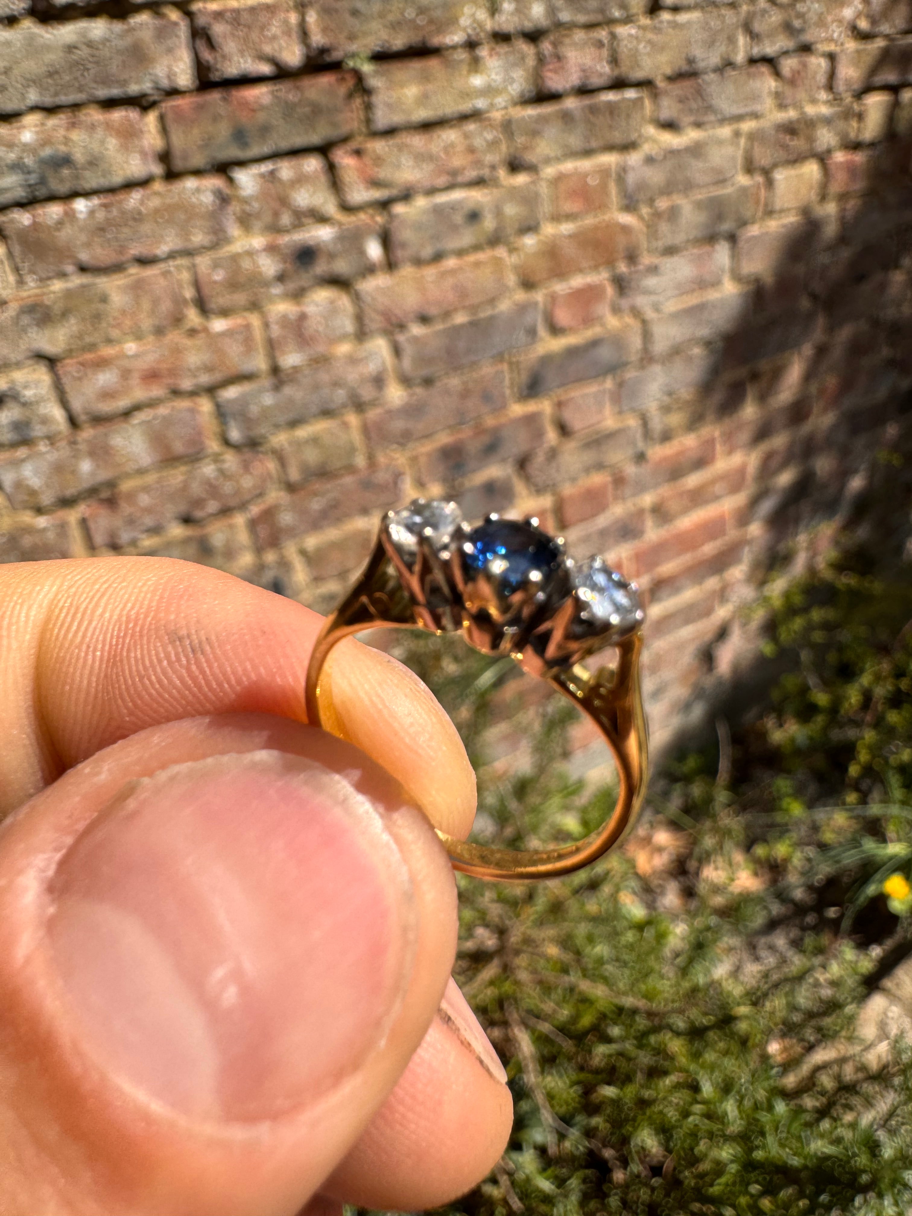 Lot 16: 18ct Trilogy Sapphire Diamond Ring (Estimate £300-400)