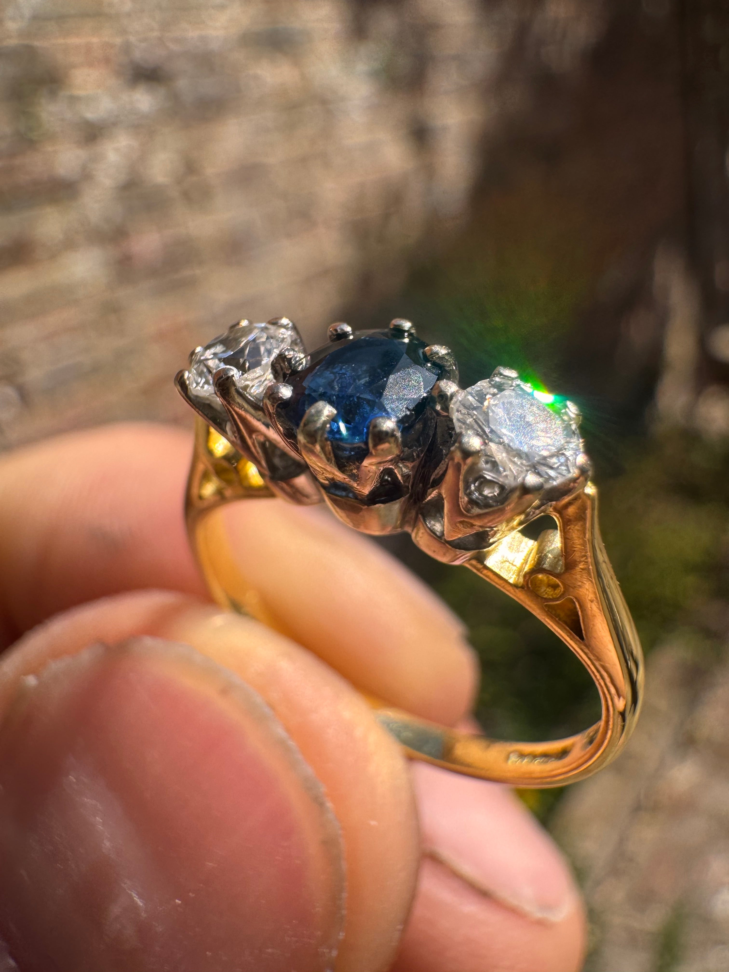 Lot 16: 18ct Trilogy Sapphire Diamond Ring (Estimate £300-400)