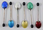A cased set of six silver and enamel coffee bean spoons