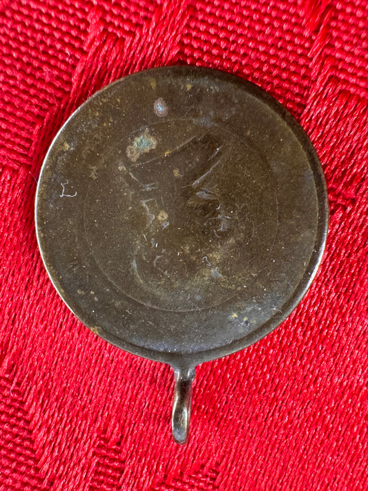 Old coin pendant