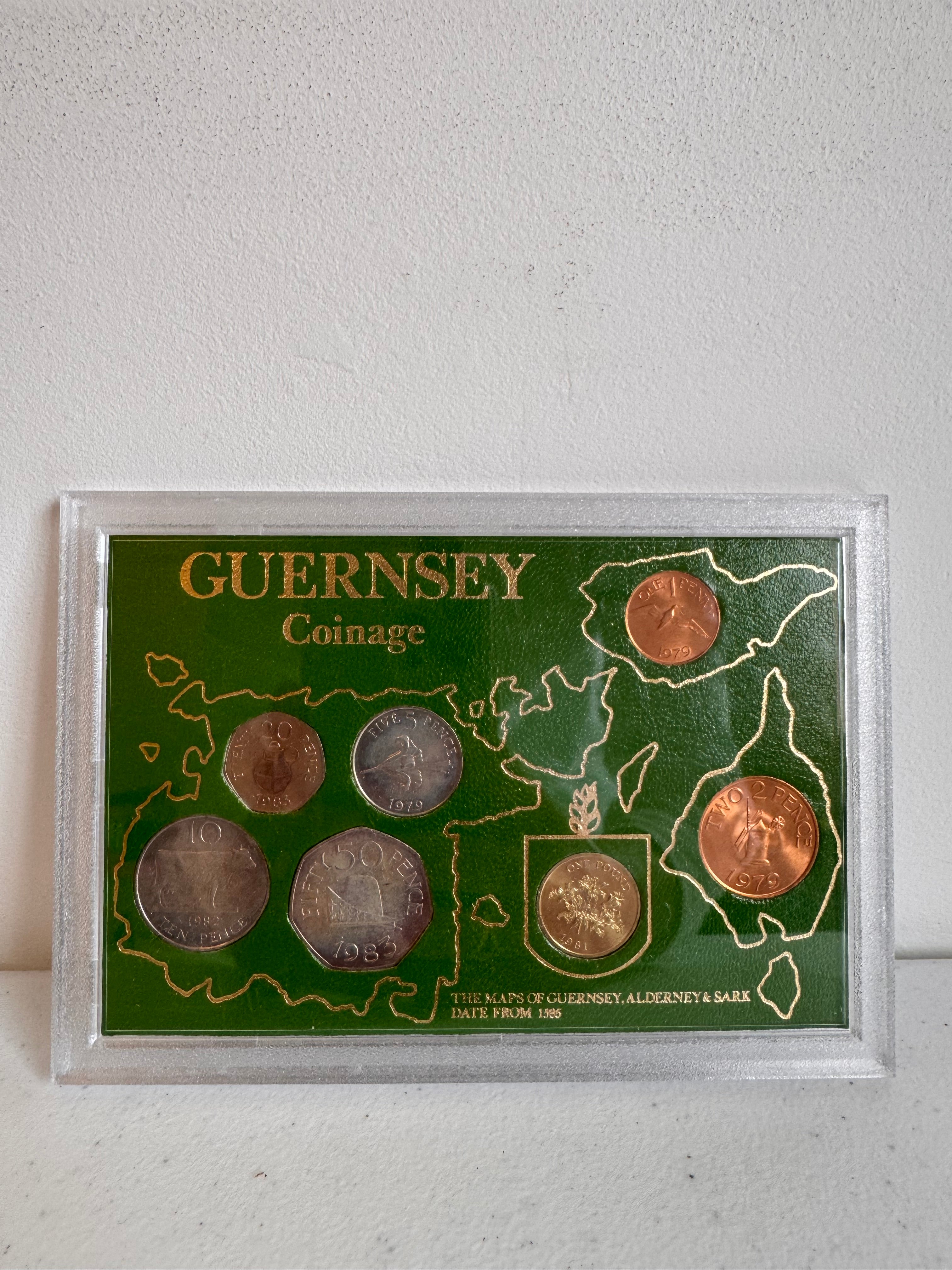 Lot 19: Guernsey coin set (Estimate £5-10)