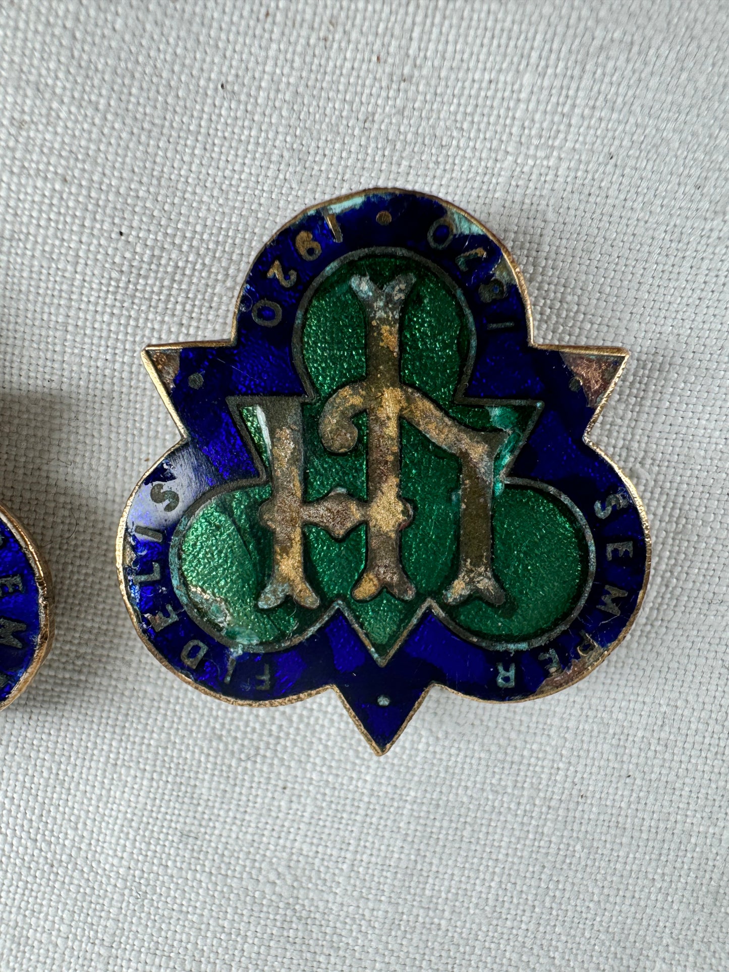 Two antique enamelled badges marked 'SEMPER FIDELIS 1870-1920' centrally  'L H'.