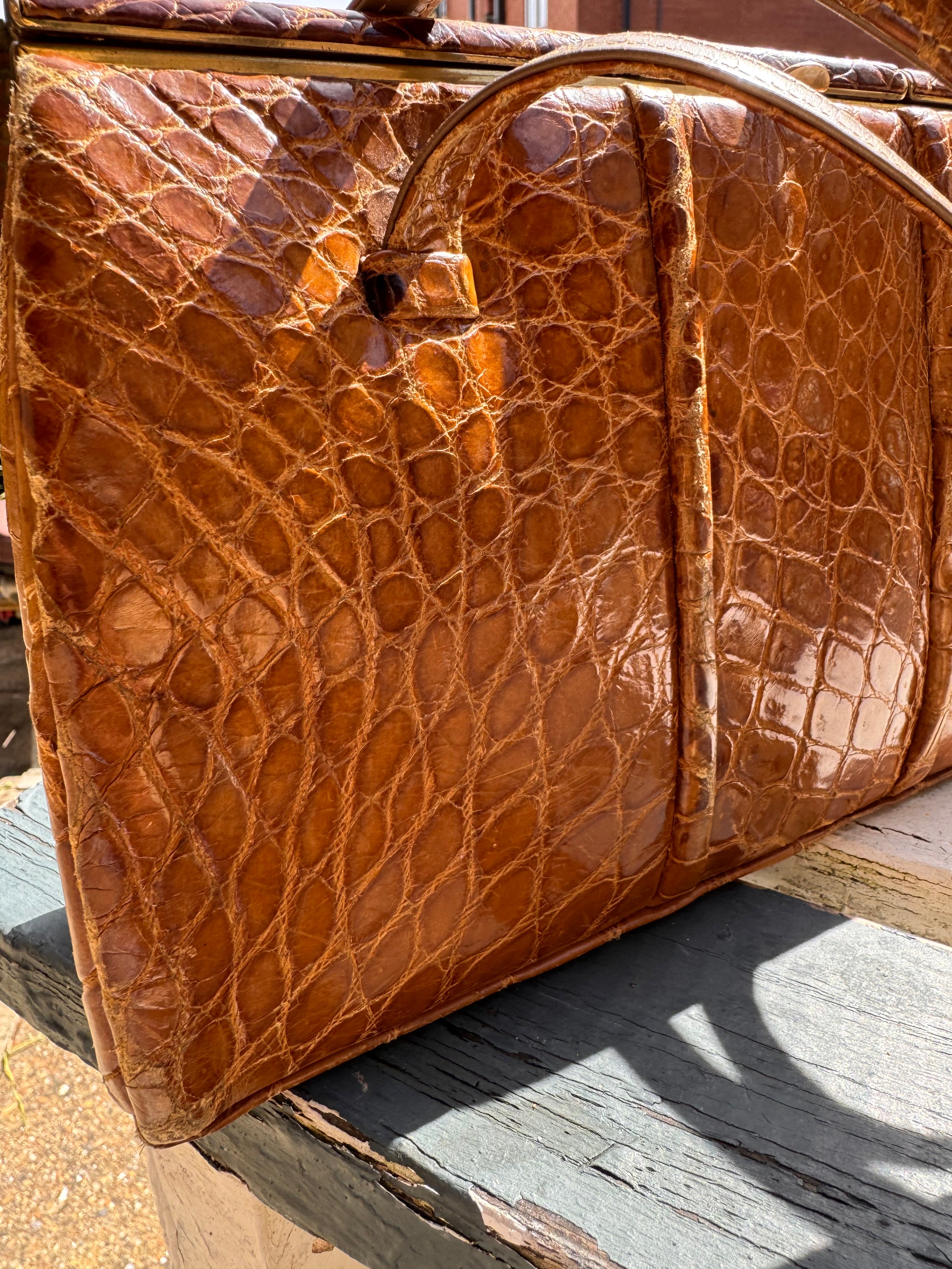 Lot 18: vintage crocodile handbag (Estimate £10-20)