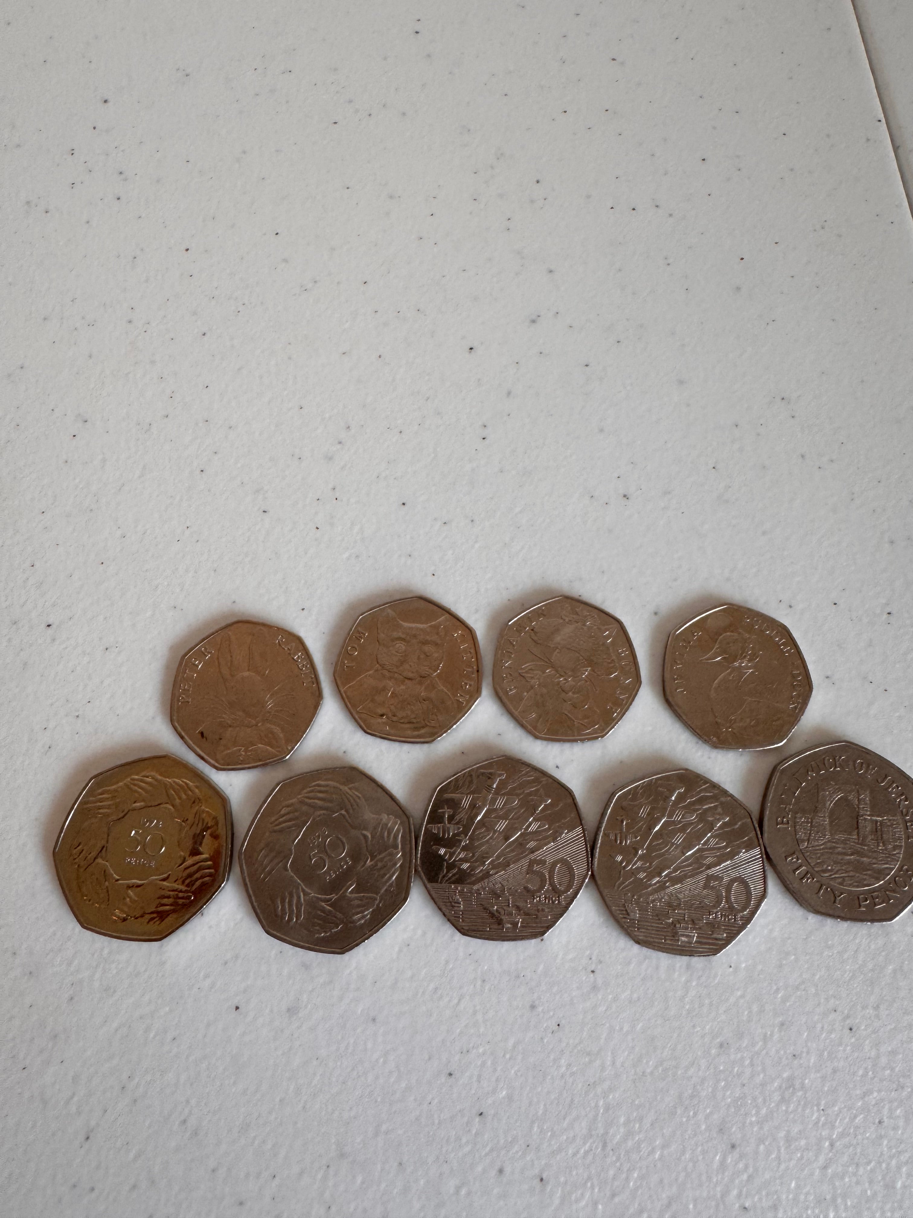 Lot 35: Rare 50ps x 9 (Estimate £10-20)