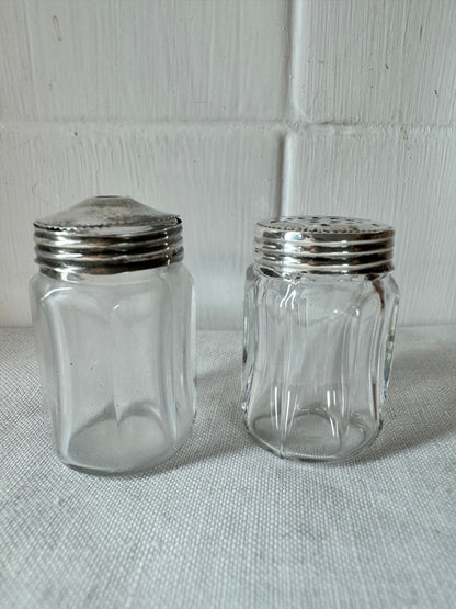 Pair of antique/vintage sterling silver topped salt and pepper pots with faceted glass