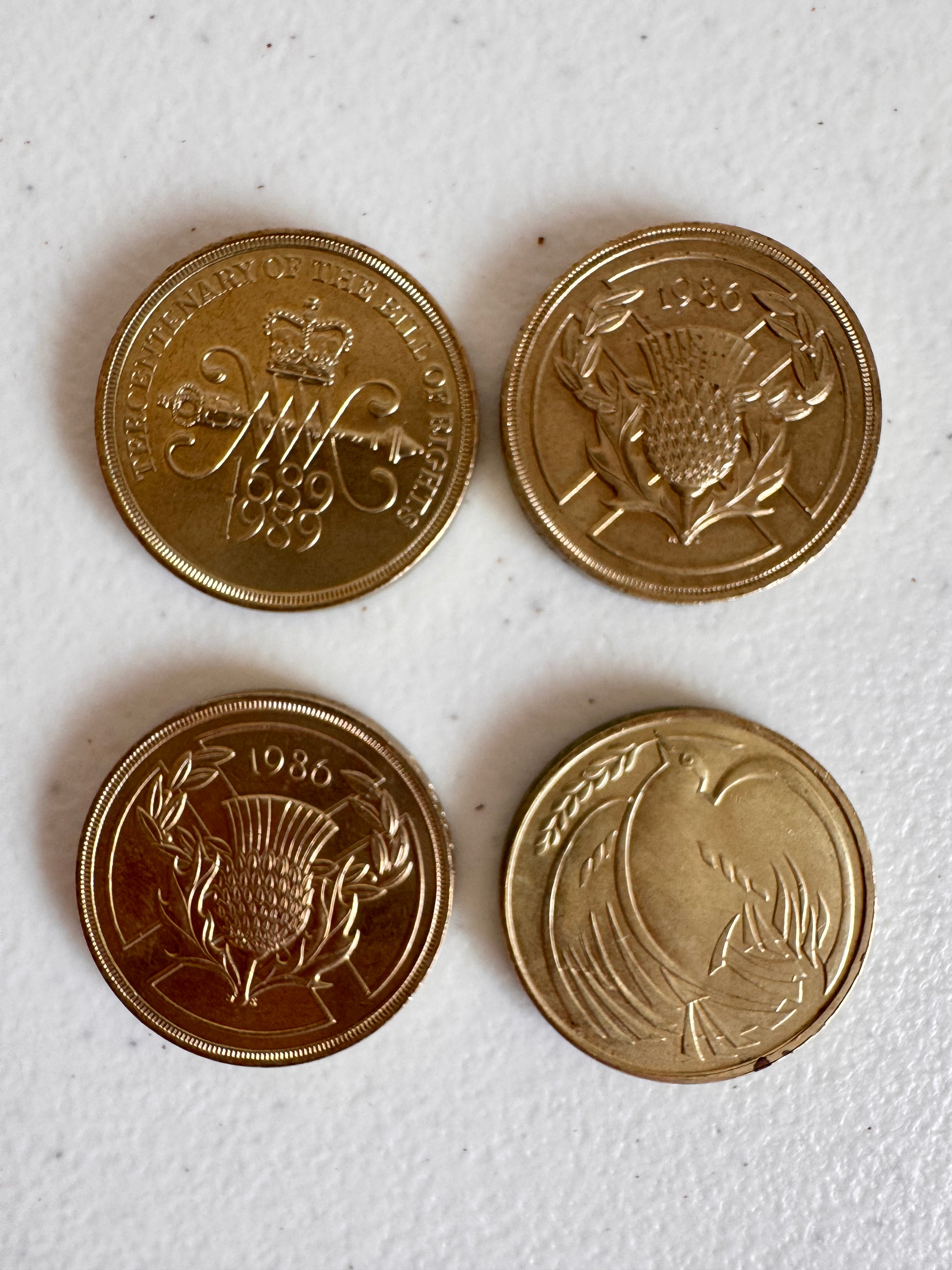 Lot 39: Rare discontinued £2 coins x 4 (Estimate £5-20)