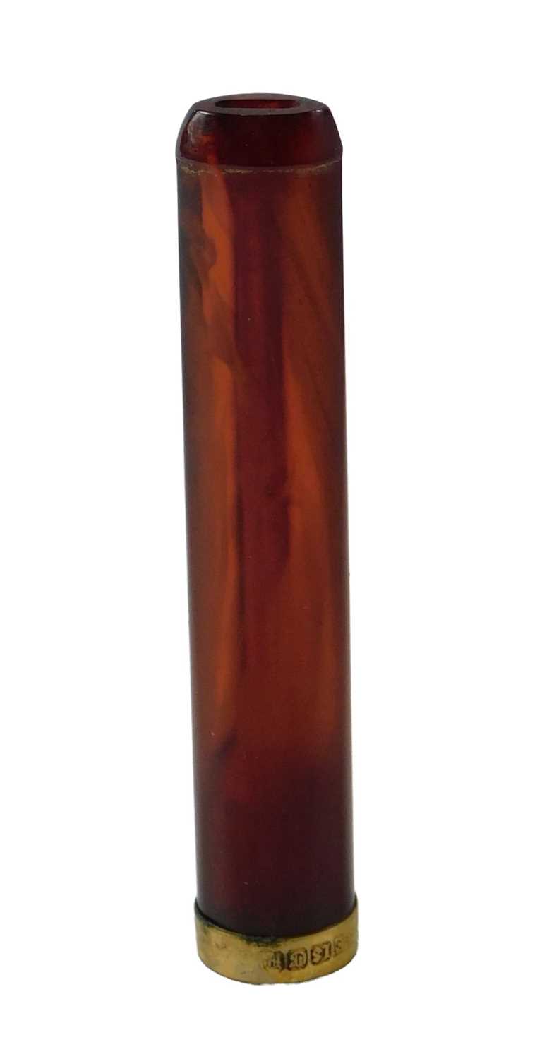(An amber cheroot holder, with an 18ct gold collar, in fitted case