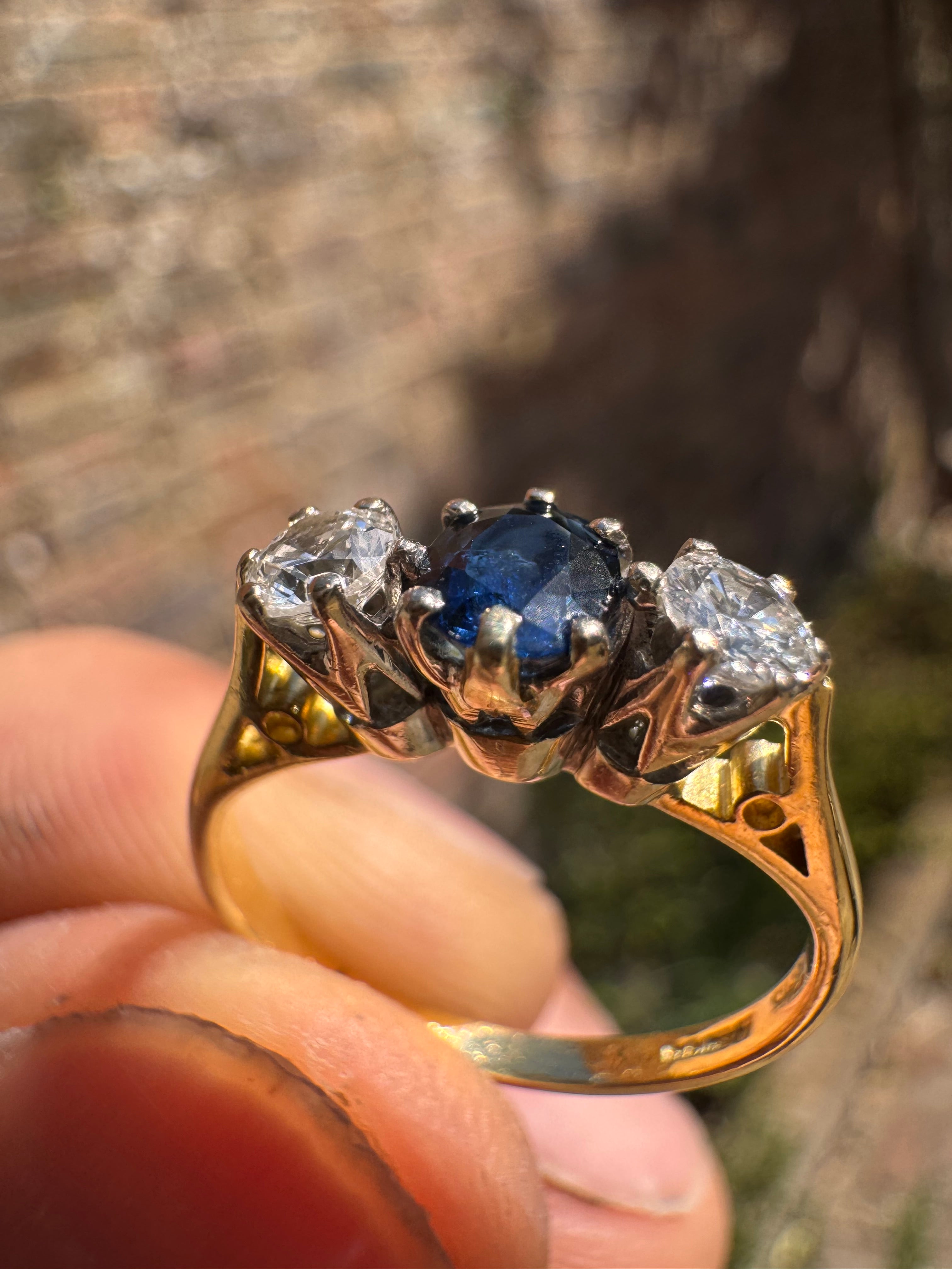 Lot 16: 18ct Trilogy Sapphire Diamond Ring (Estimate £300-400)
