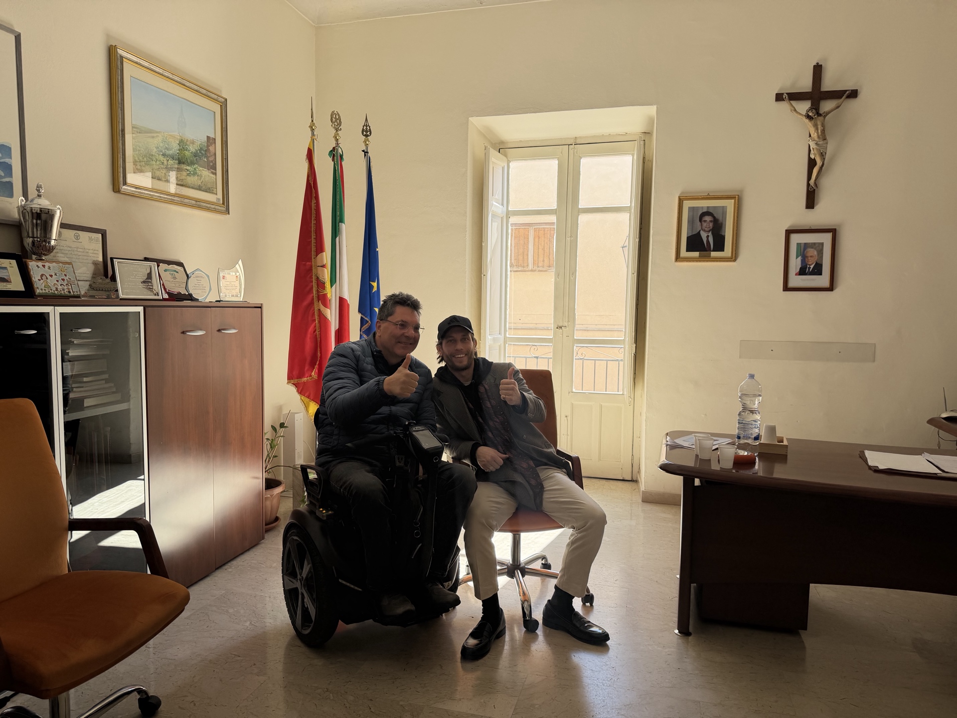 George with the Mayor of Valledolmo — the €1 home scheme town
